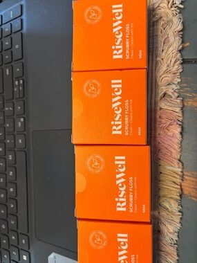RiseWell Scrubby Floss - Bright Orange Mint Boxes (4)